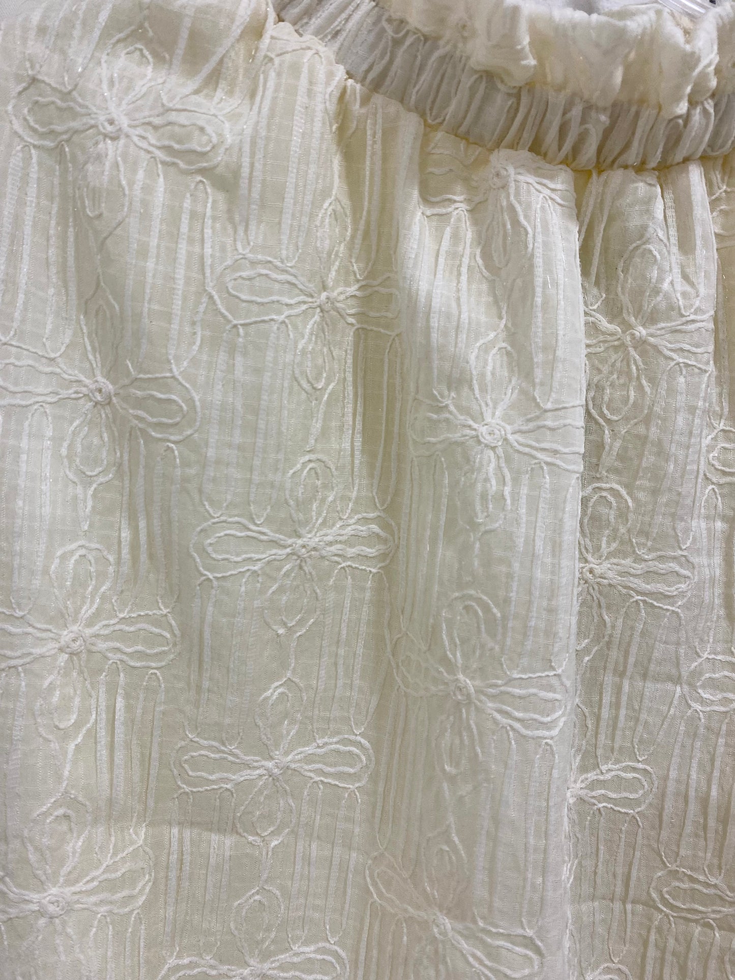 Sleeveless textured flower top